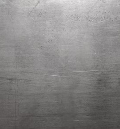 Surface d’une plaque d’acier brute destinée à un projet de Fabrication Corten sur mesure